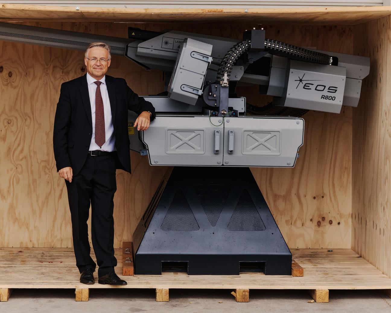 EOS CEO Andreas Schwer with the R800 remote weapon system