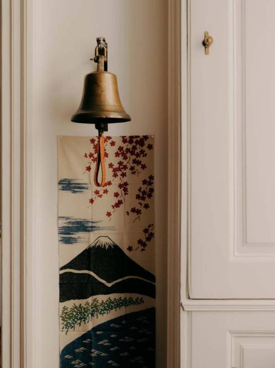 A bell and Japanese print.