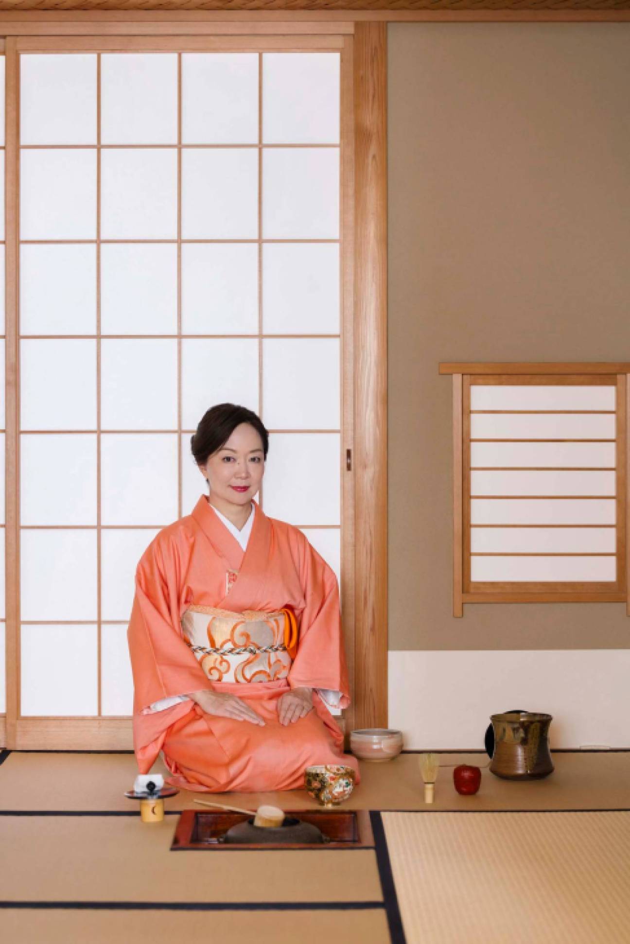 A portrait of Machiko Soshin Hoshina laying out her utensils.