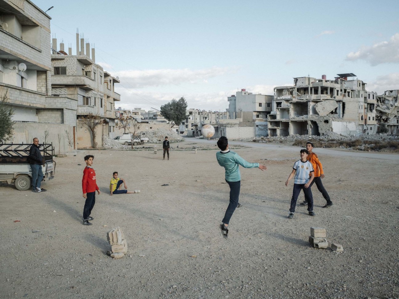 Syria, Damascus, 2025. Children play football on the street in Daraya (Western Ghouta), suburb of Damascus.

Daraya was attacked with chemical weapons in August 2013, and besieged for years by the Syrian regime.