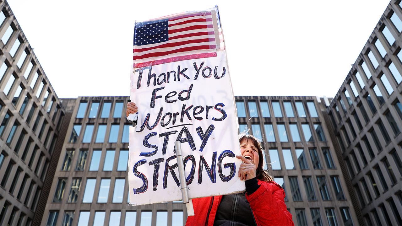 US judge blocks Trump’s firing of federal workers