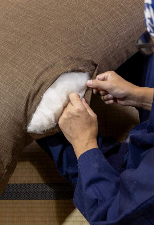 A pillow seam being stitched.