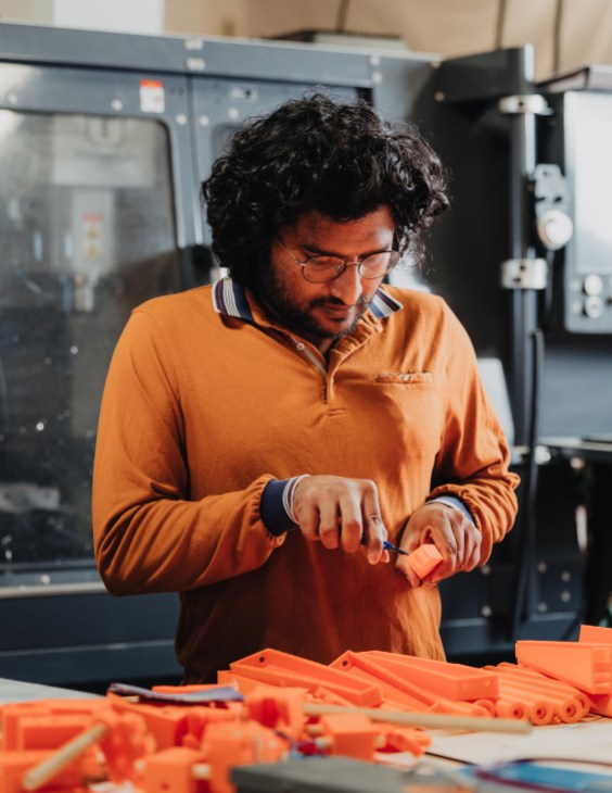 Senior mechanical engineer Harsha Reddy preparing test prints
