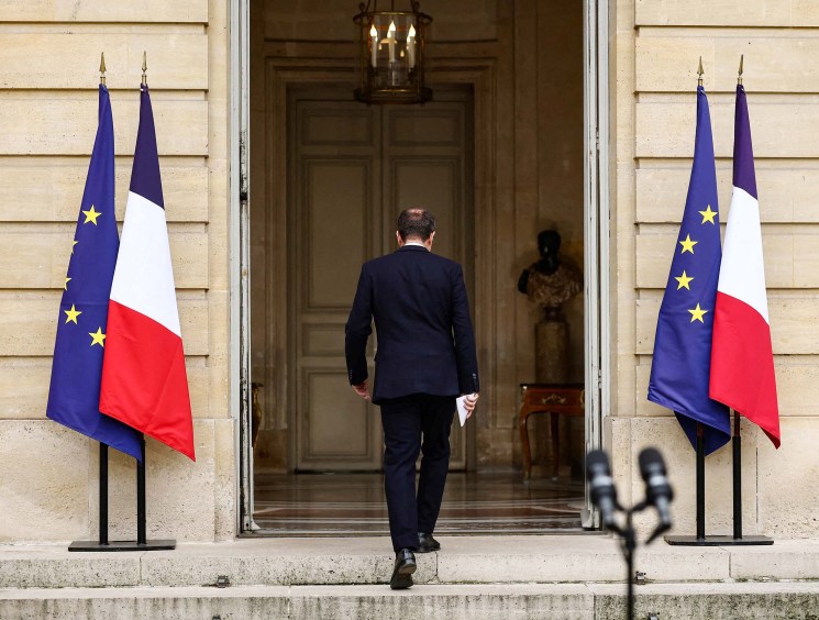 TOPSHOT - Outgoing French Prime Minister Sebastien Lecornu, who submitted his government's resignation to the French President this morning, leaves after delivering a statement at the Hotel Matignon in Paris, on October 6, 2025. France's President Emmanuel Macron on October 6, 2025 accepted Prime Minister Sebastien Lecornu's resignation, the presidency said, plunging the European nation further into political deadlock. Macron named Lecornu last month to the post, but the largely unchanged cabinet lineup he unveiled late October 5, 2025 was met with fierce criticism across the political spectrum. (Photo by Stephane Mahe / POOL / AFP) (Photo by STEPHANE MAHE/POOL/AFP via Getty Images)
