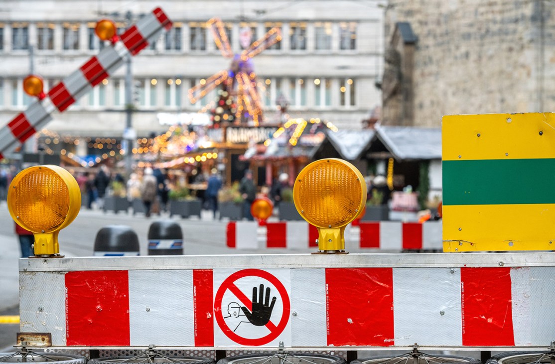 HALLE, GERMANY - NOVEMBER 26: New security systems involving barriers and road level nail traps have been placed at the road entrances to the Christmas Market to restrict vehicle access with public trams being the only exception on November 26, 2025 in Halle (Saale), Saxony-Anhalt, Germany. Many German Christmas markets are having to increase their security measures following the Magdeburg Christmas market attack last year. On December 20, 2024 Taleb al-Abdulmohsen drove a car into the crowded open-air market, killing six people and injuring over 300. The city of Halle has experienced a terror attack back in October 2019 during the Jewish holiday of Yom Kippur when a Synagogue and Turkish restaurant were attacked by a far right gun man resulting in 2 fatalities. (Photo by Craig Stennett/Getty Images)