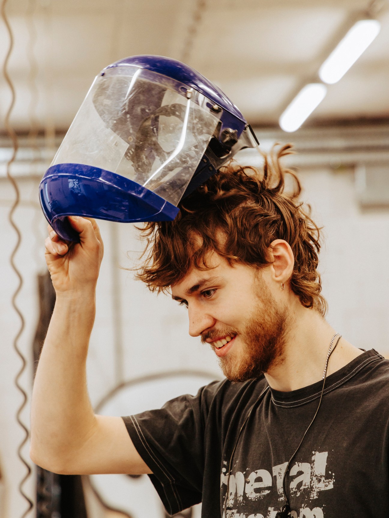 Metal-working technician Stas Macleod teaching students