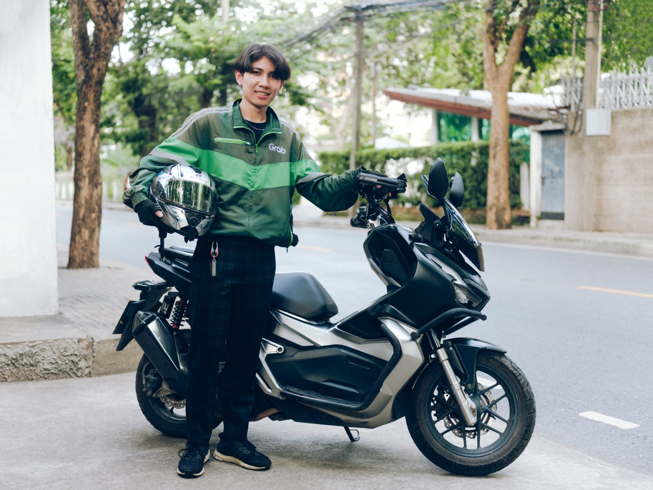 Grab motorbike driver in Southeast Asia