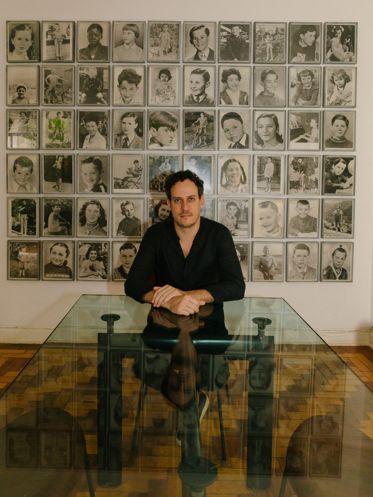 Gustavo Nóbrega, co-founder of Galeria Superfície, with his art collection