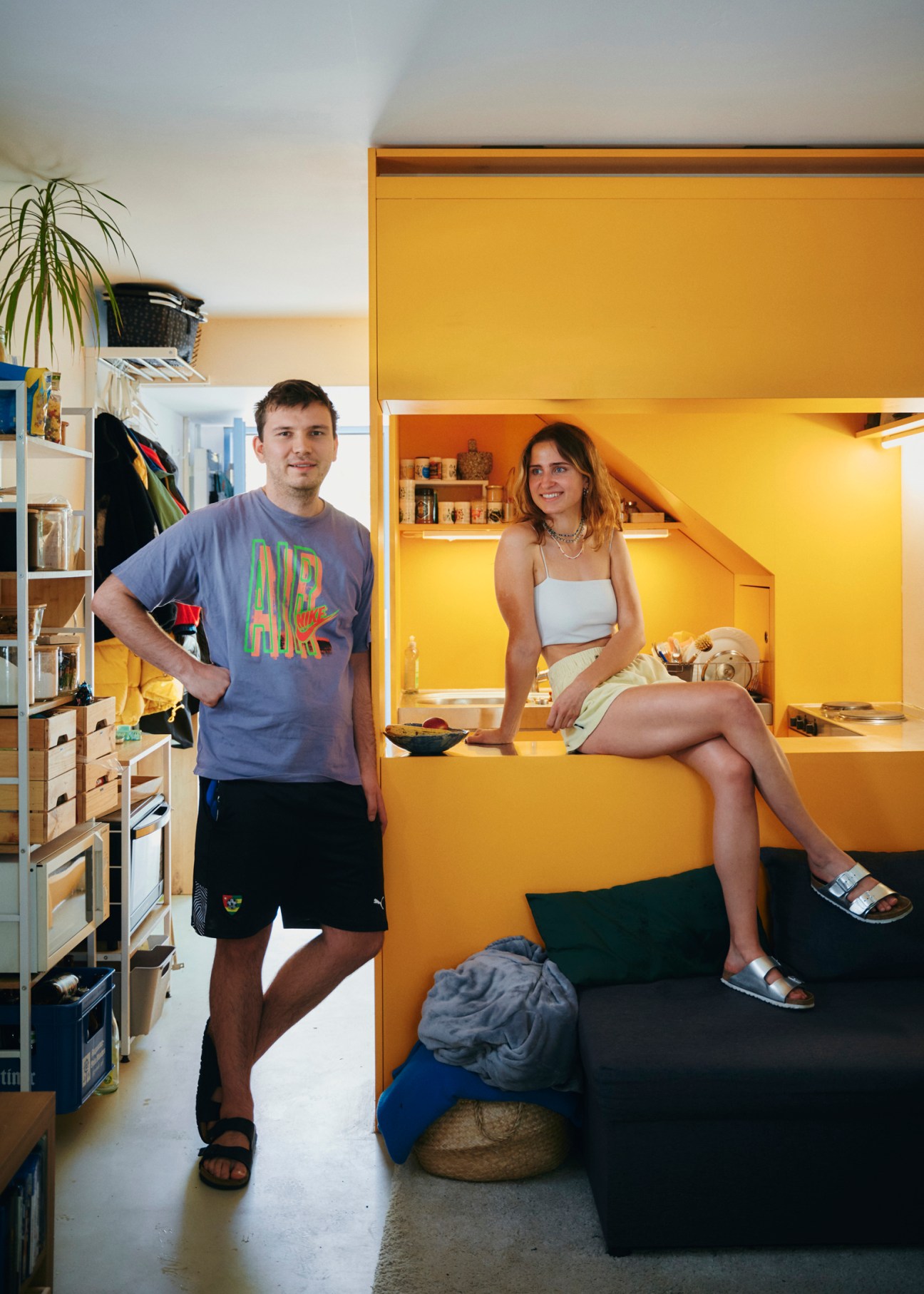 A couple in their shared Olympic village bungalow home