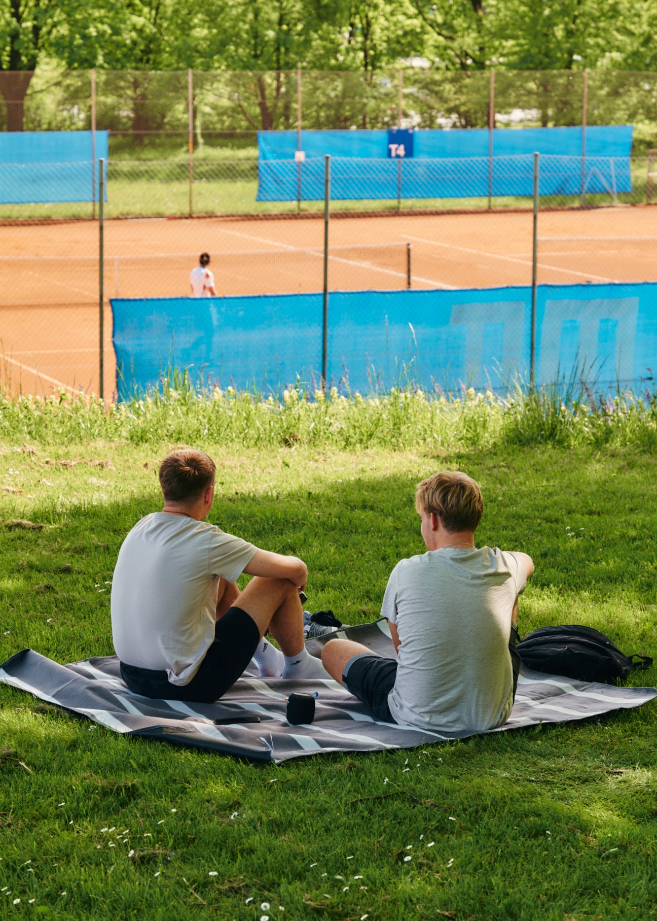People enjoying outdoor leisure activities in Olympiapark