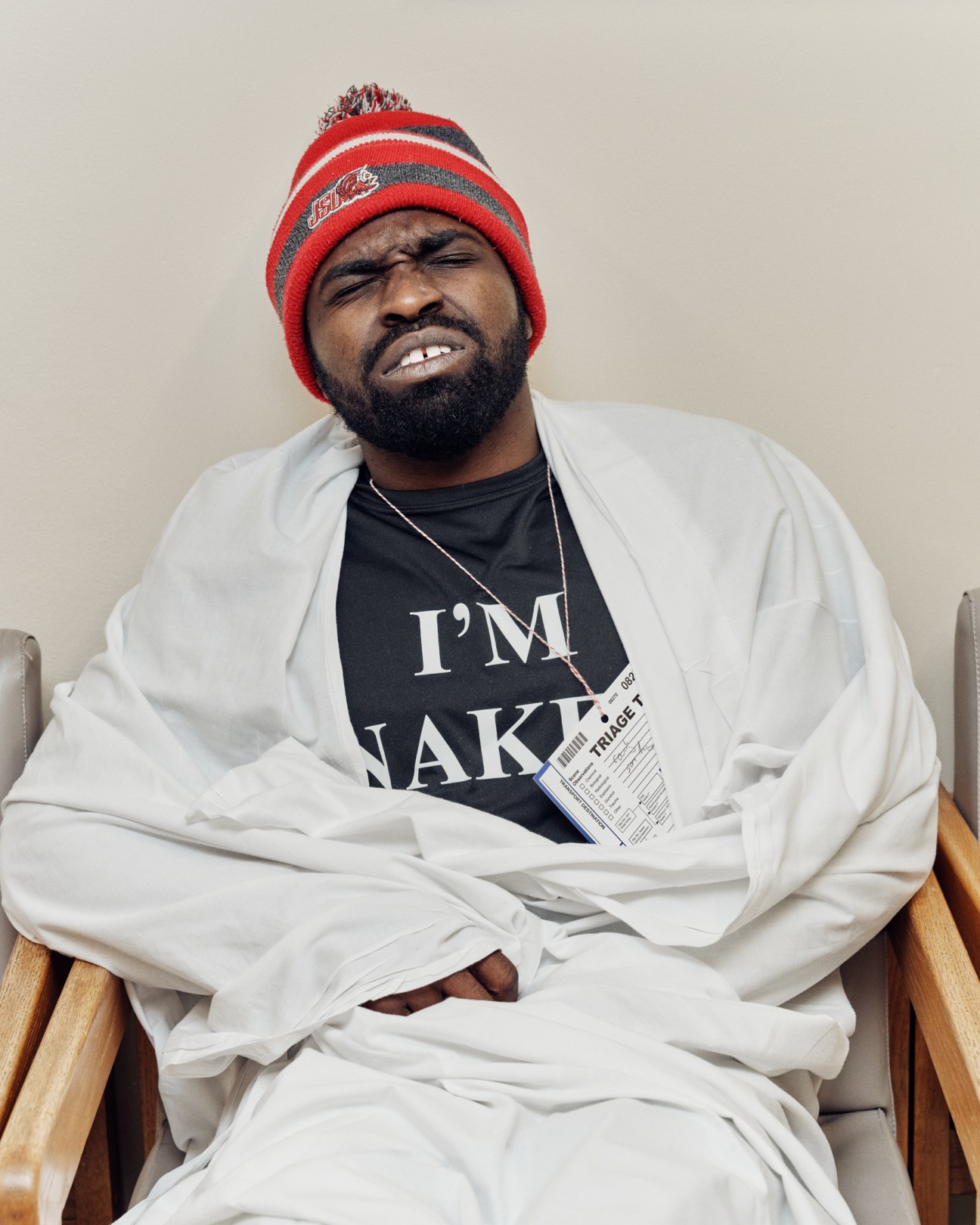 Actor wearing a T-shirt indicating they should be treated as if naked during decontamination