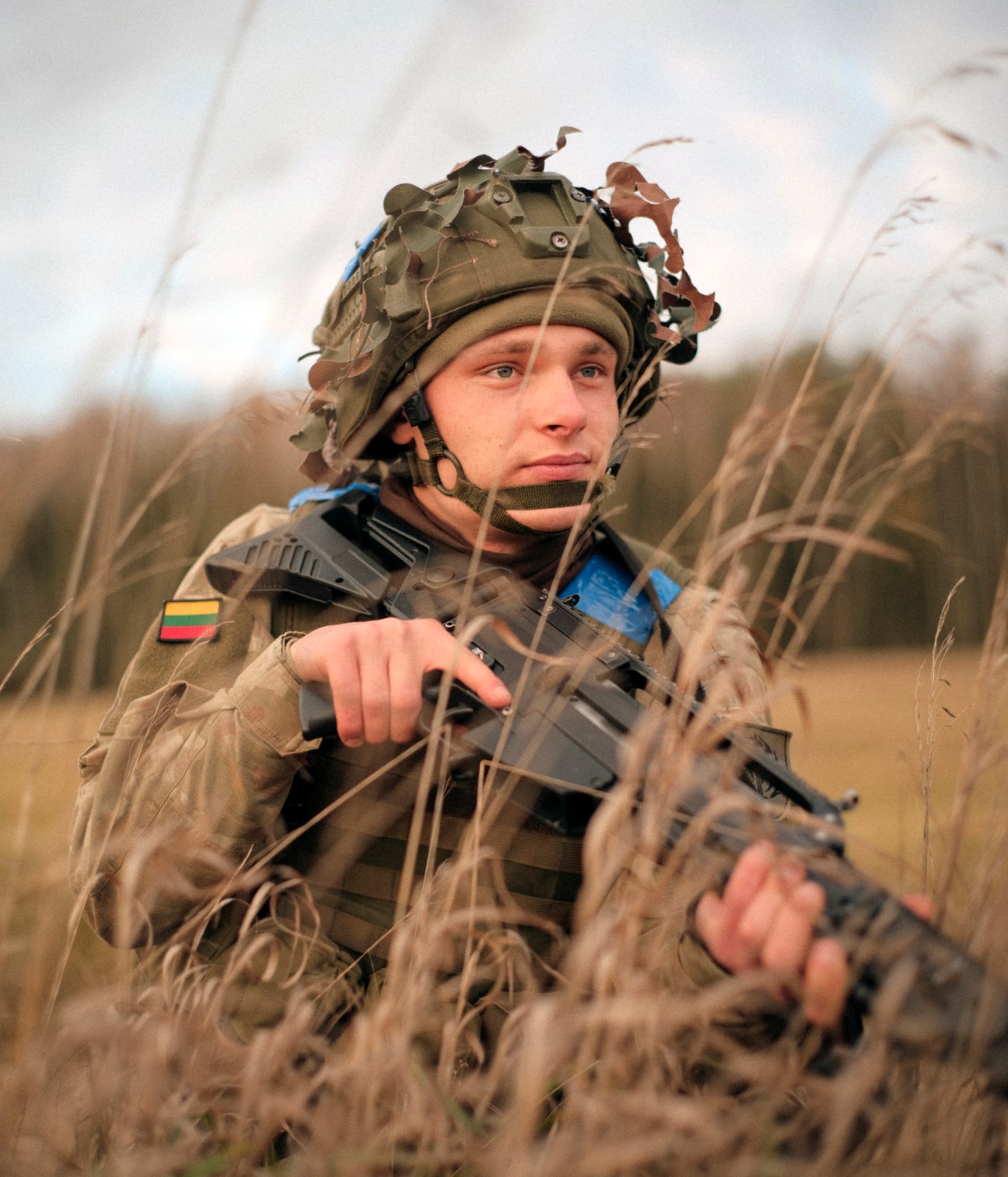 Lithuanian conscript soldiers preparing for exercise