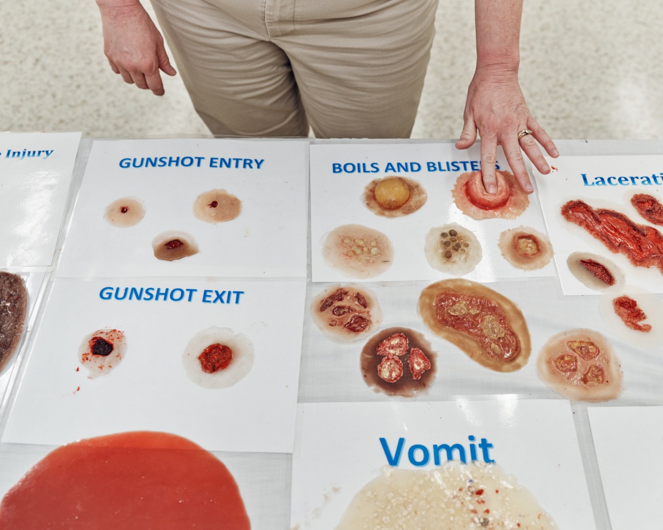 Special-effects style display of various simulated wounds used for training