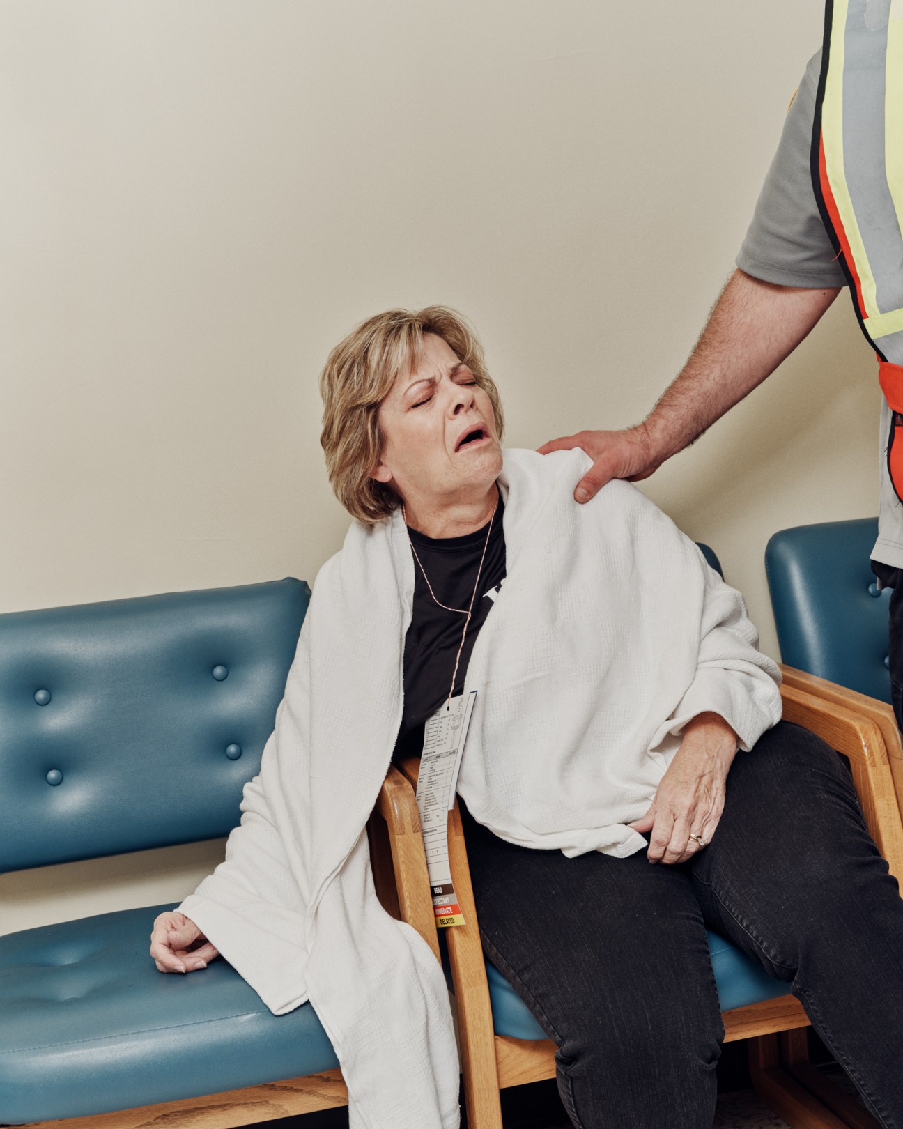 Local actor playing the role of a victim in the training exercise