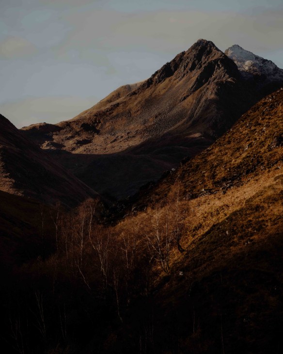 Sunlight on Scottish mountain peaks