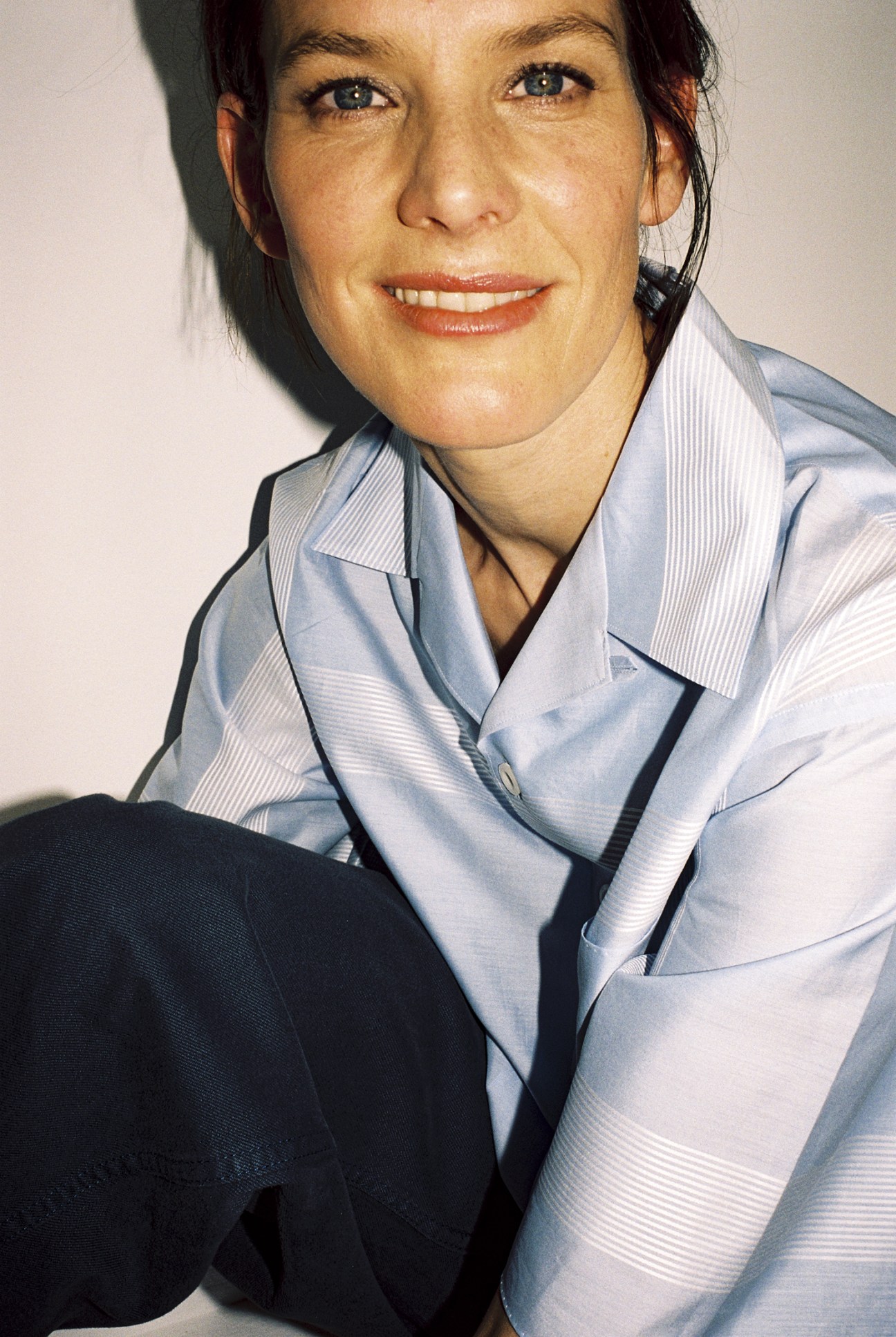 Gesa Hansen wears shirt by Prada, trousers by Soeur