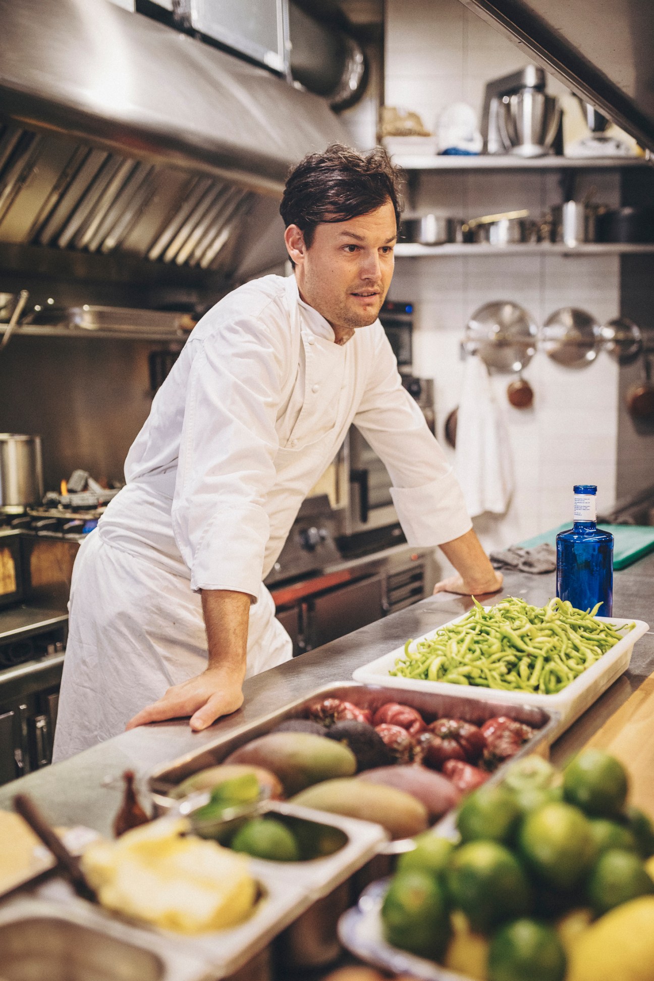 Balázs Menyhard surveys his kitchen