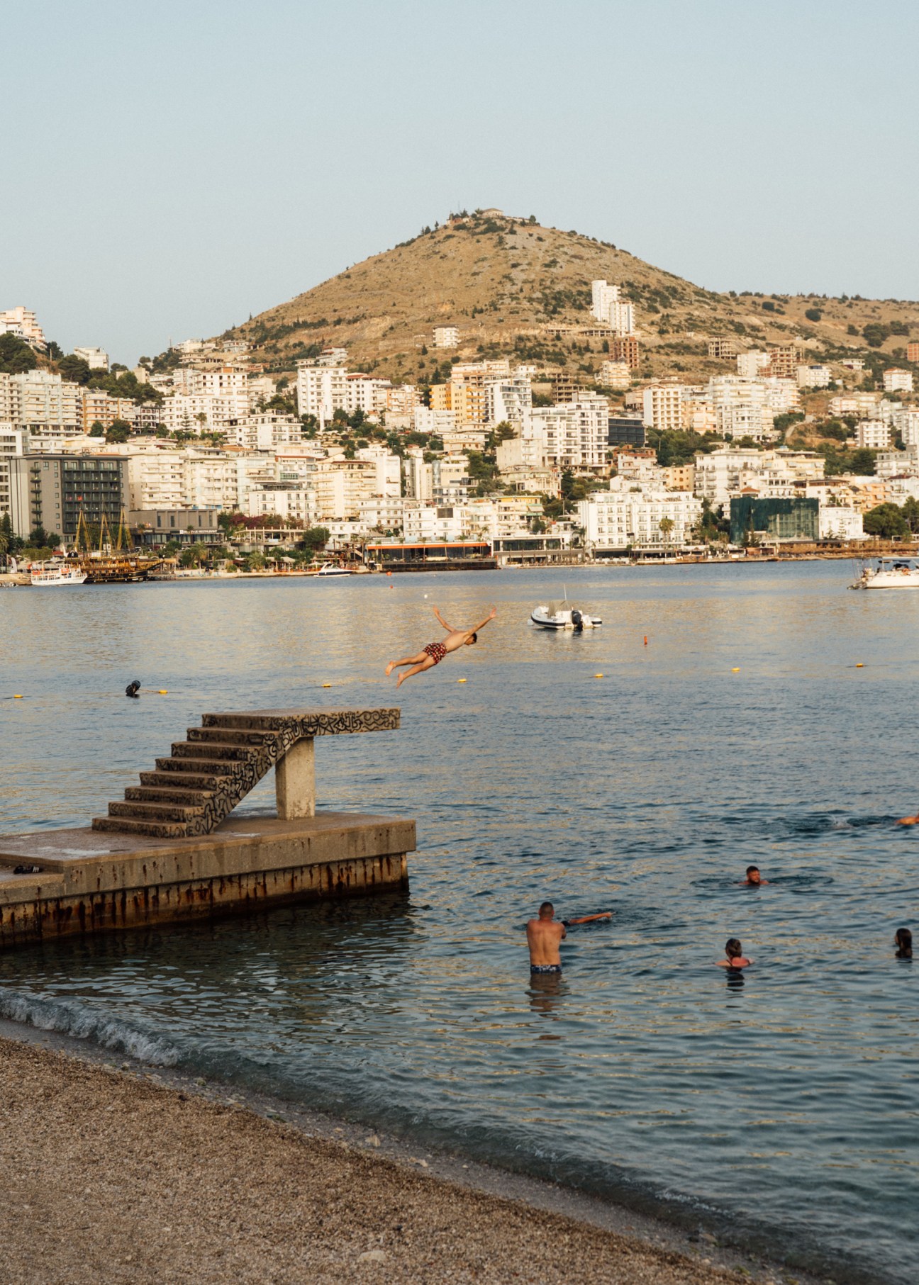 jumping into the sea in a bay