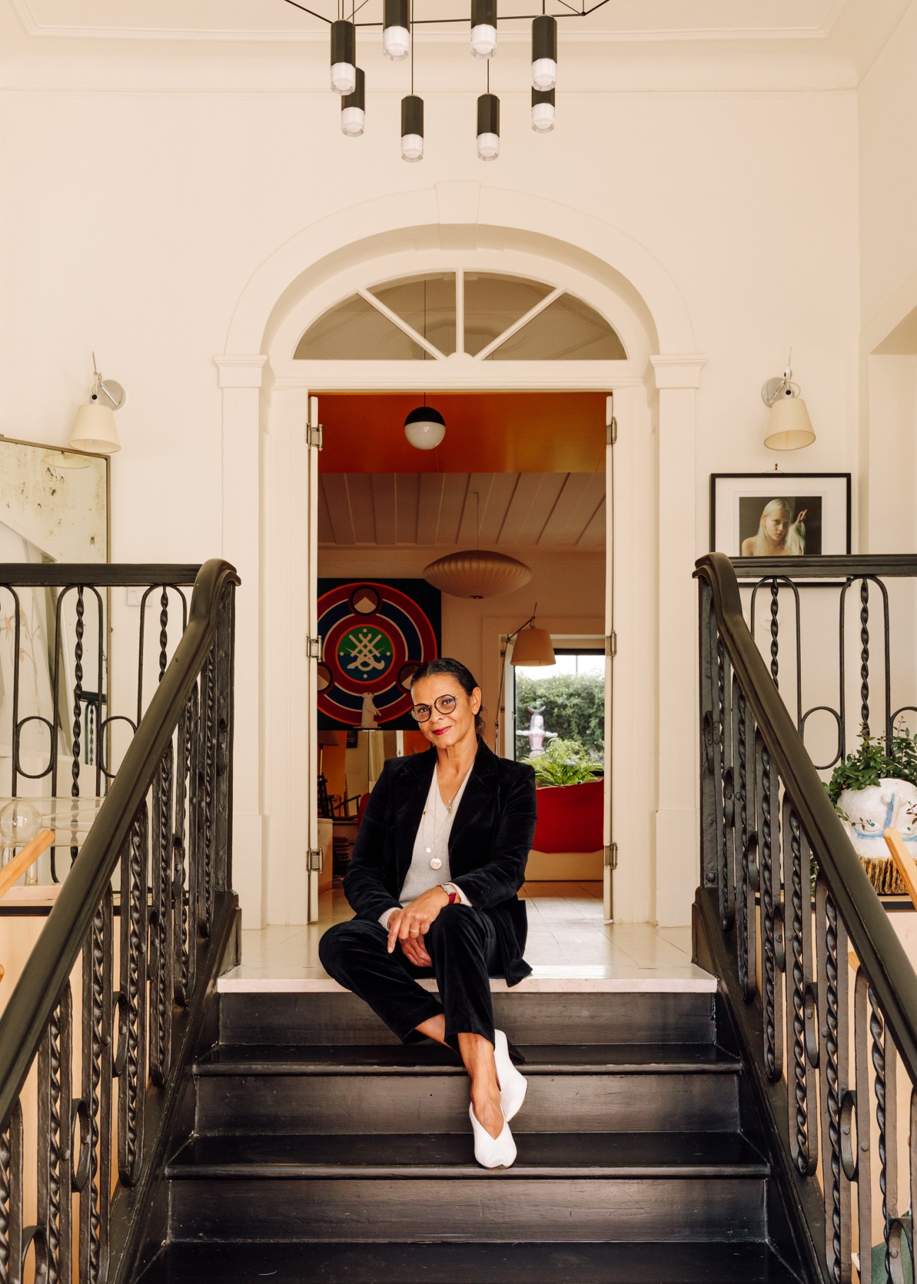 woman sitting to steps
