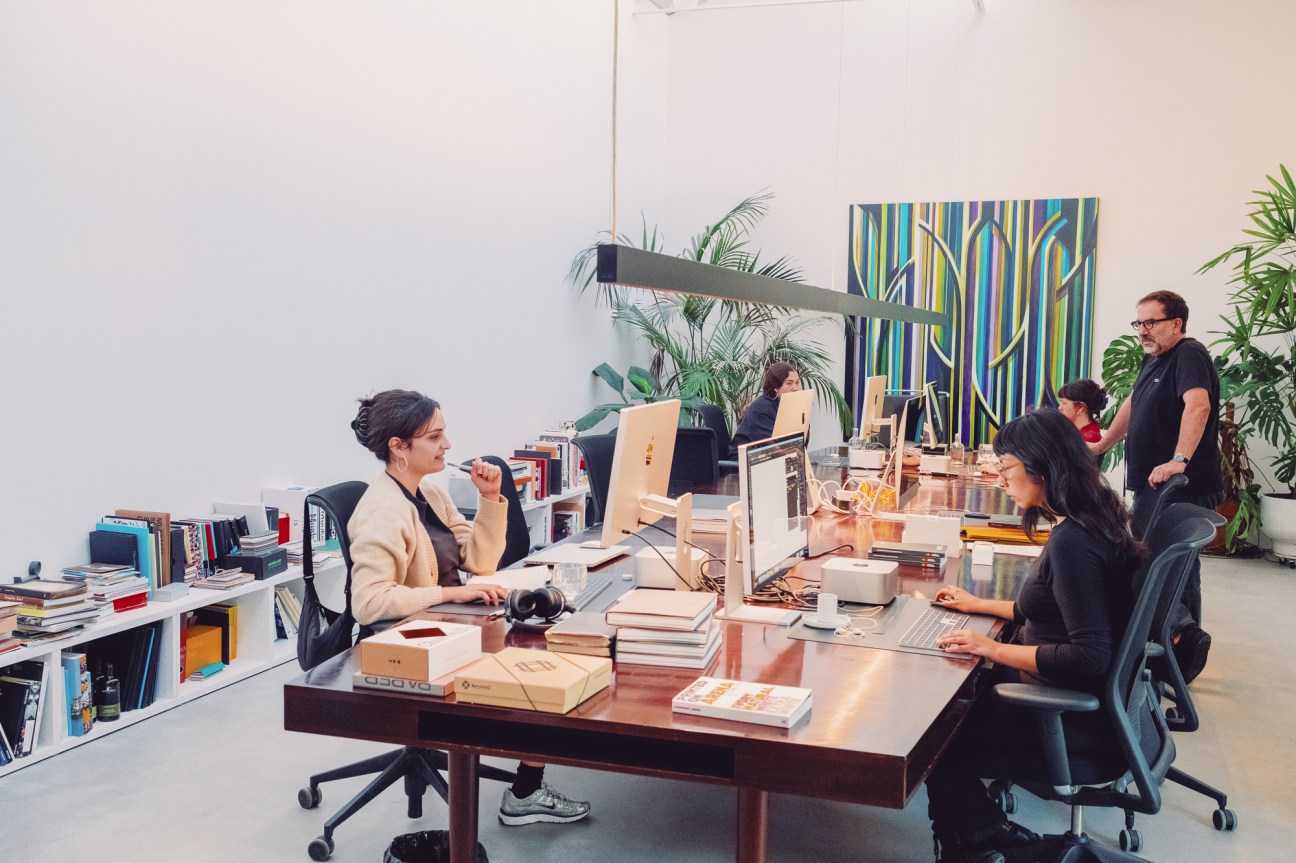 Aires at the studio with his professionally diverse team