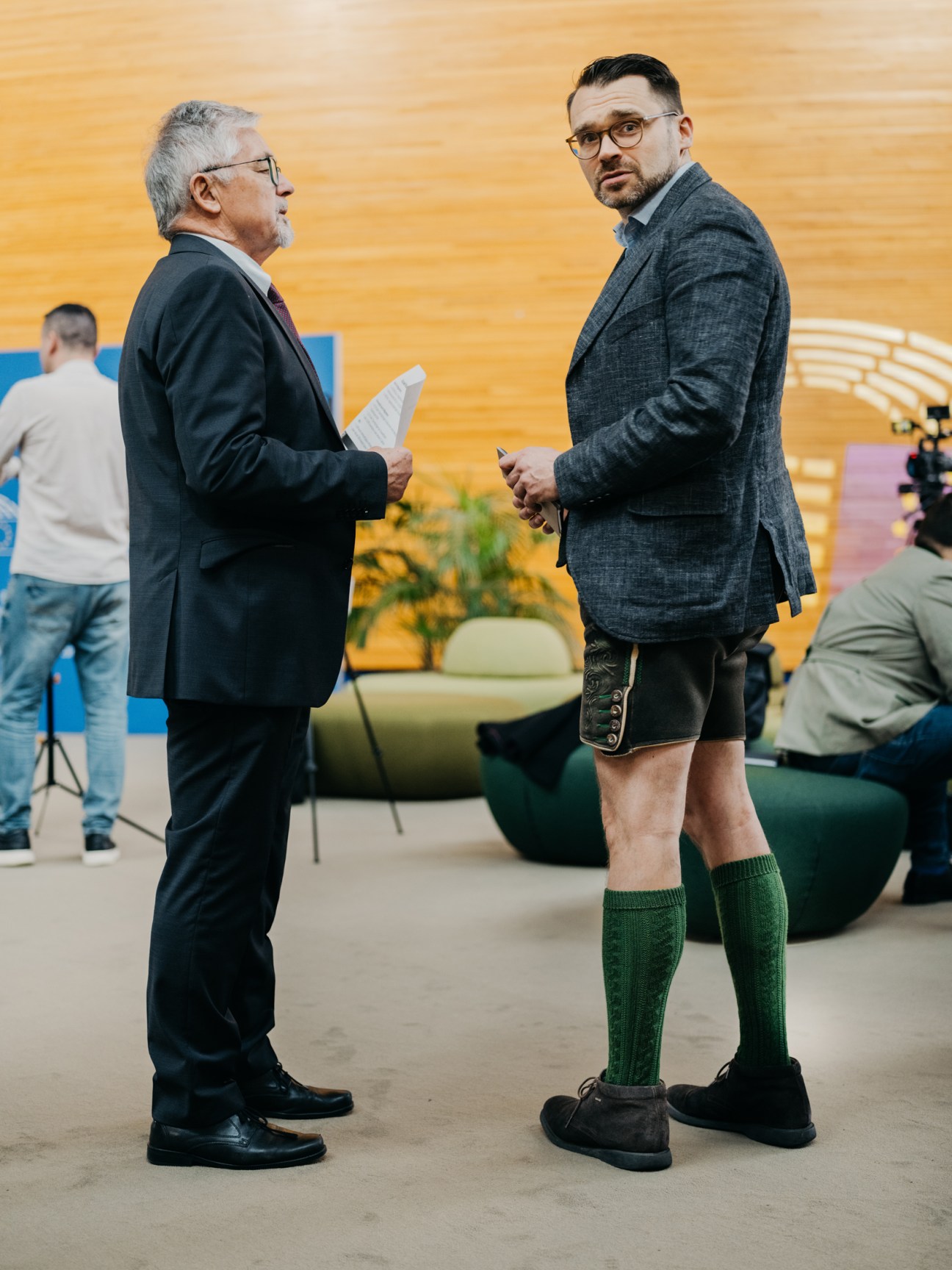 Man in shorts at an EU meeting