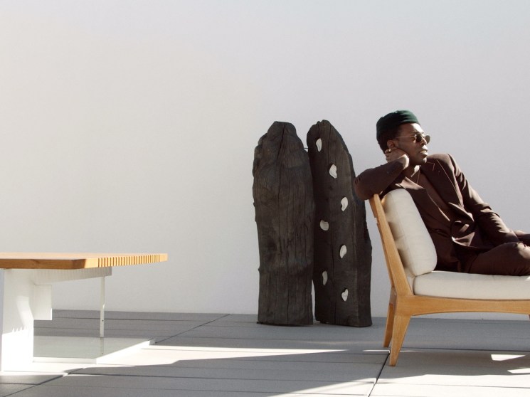 A man sitting on a terrace.