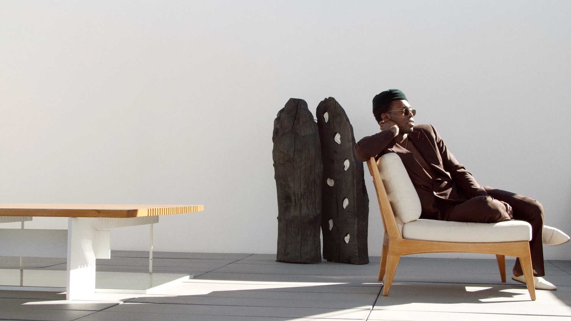 A man sitting on a terrace.
