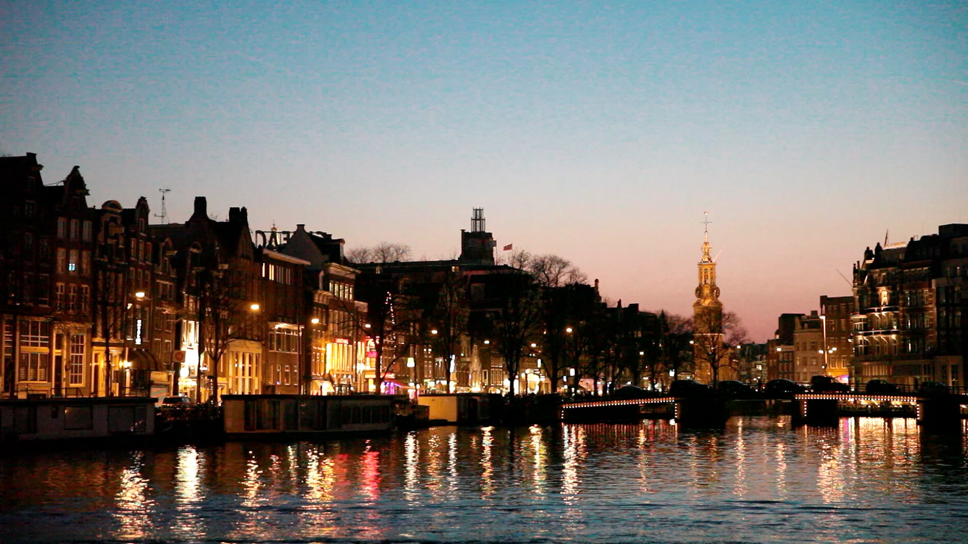 The city centre of Amsterdam at night.