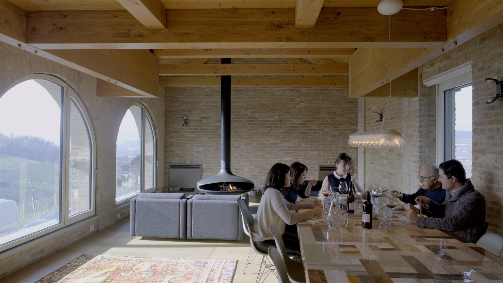 A family having lunch with wine.