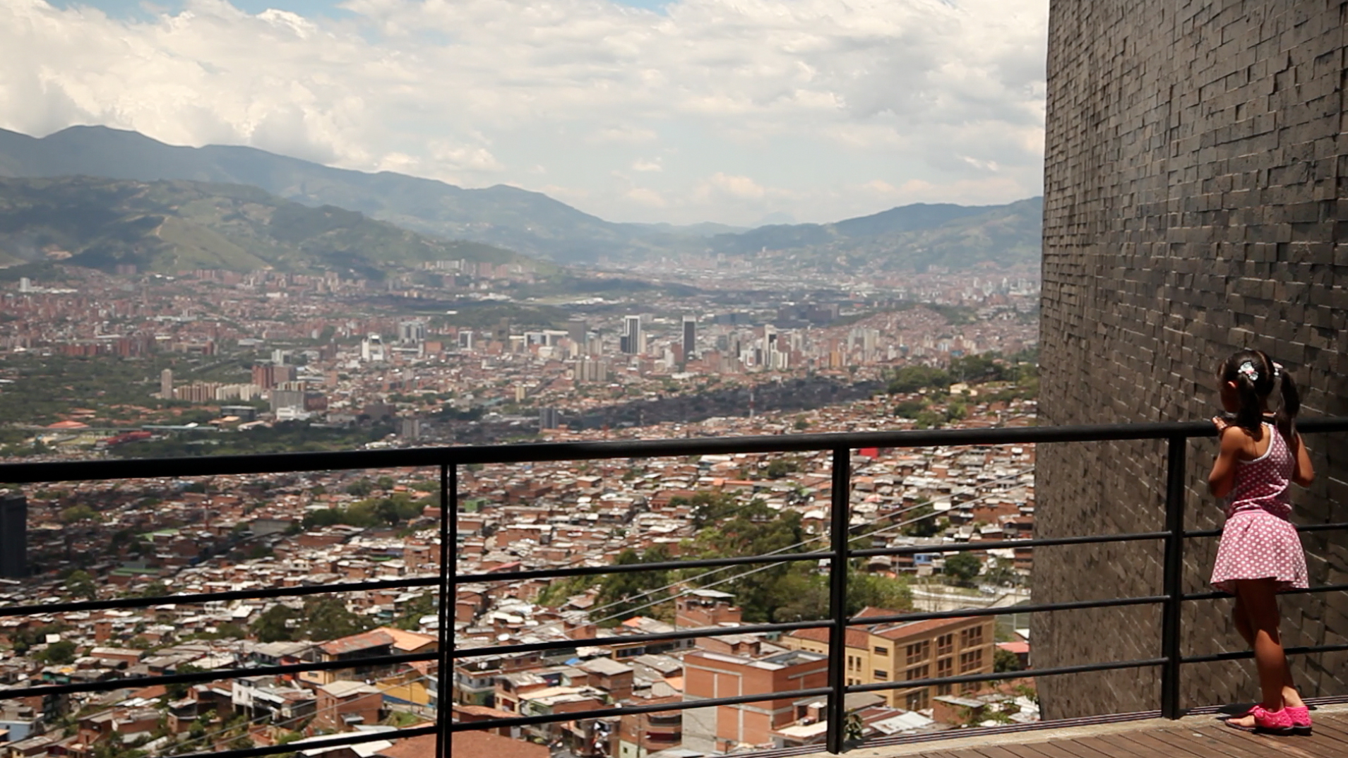 girl looking over city