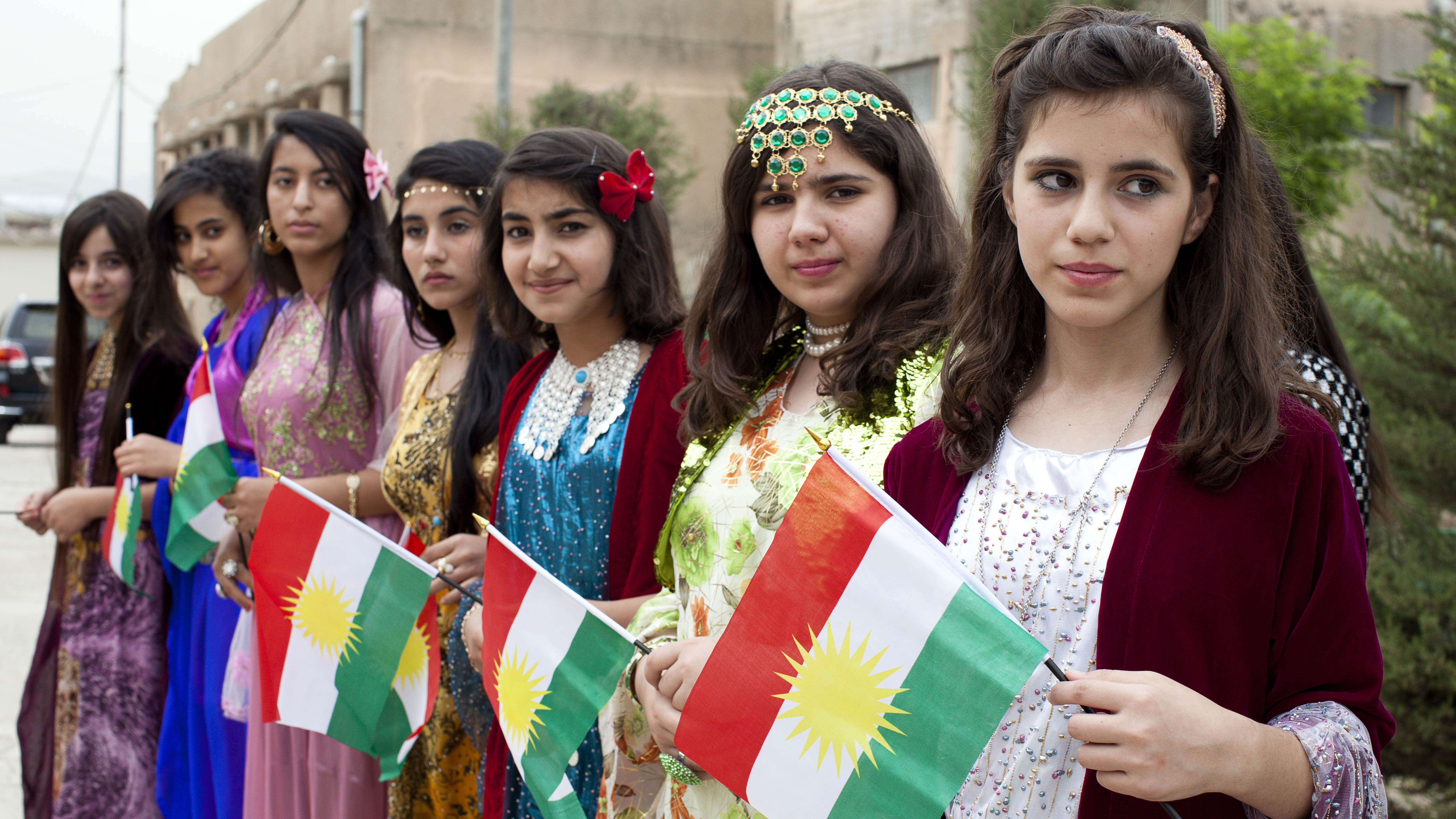 Kurdish women with flags