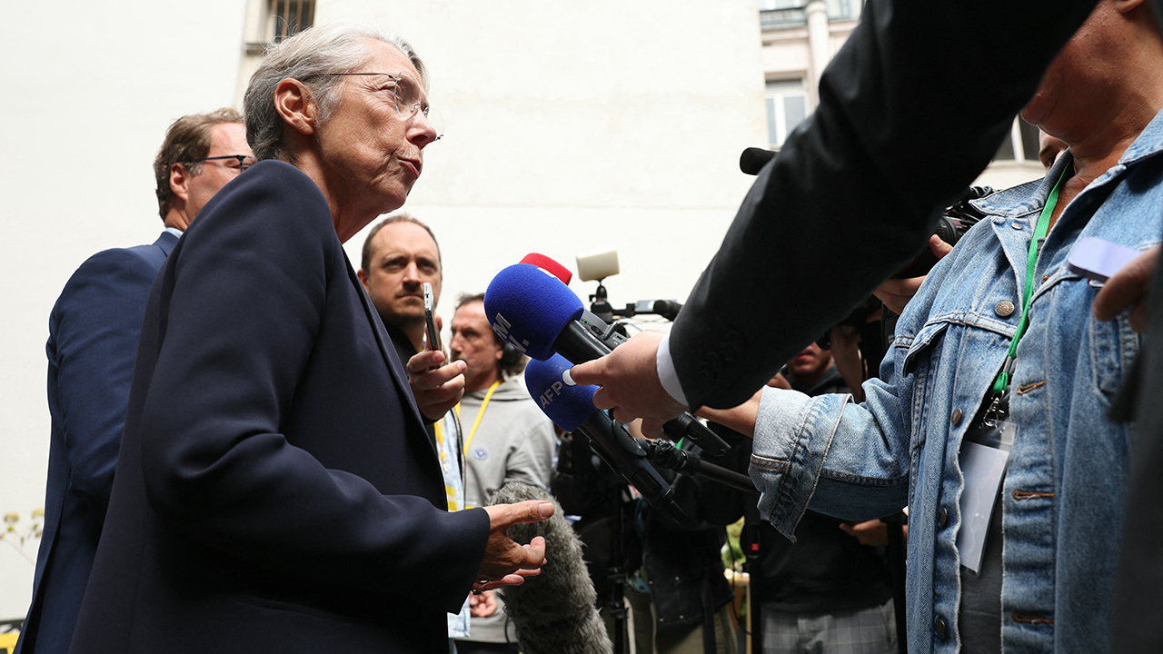 Macron’s Renaissance party narrowly avoids unity crisis